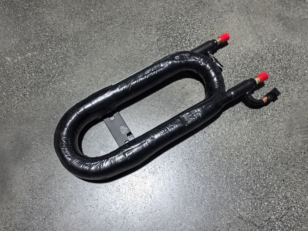 Échangeur de chaleur coaxial avec température de fonctionnement de 20°C à 65°C, hauteur de 520 mm et débit d'eau de 3 m³/h pour une gestion thermique efficace